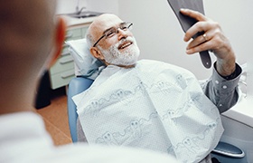 Patient smiling in the dentist’s chair