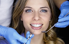 Woman receiving specialty dentistry