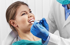 a patient receiving cosmetic dental bonding