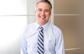 businessman smiling in an office