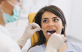 Woman receiving root canal therapy