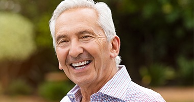 Smiling older man after restorative dentistry